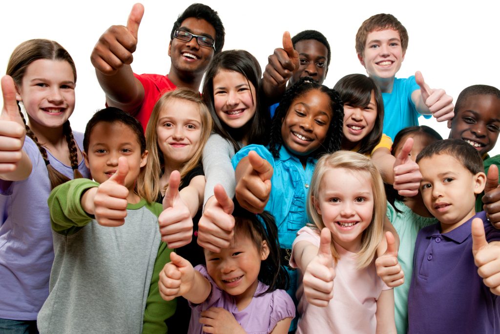 Group of kids with their thumbs up